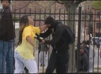 Baltimore mother hailed 'mother of the year' after she catches masked son rioting after Freddie Gray funeral.