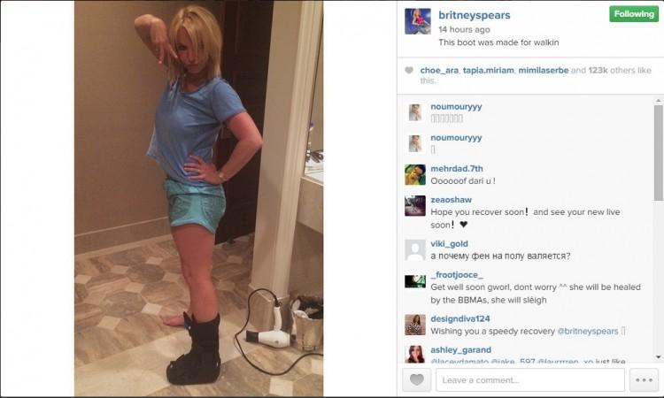 Britney Spear Poses with her twisted ankle. Britney Spears