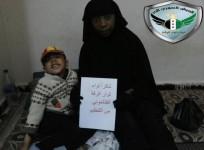 Syrian rebels hoodwinked Isis and helped a French woman escape along with her son. The woman identified as Nikolai holds a Thank You note as she poses with her son after escaping from Raqqa.