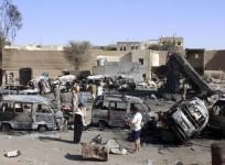 Burnt-out vehicles are seen at a gas station after it was hit by an air strike in Yemen's northwestern city of Saada, April 16, 2015.