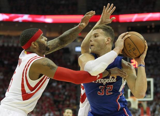Blake Griffin (in blue) averages 18.4 in 2015 NBA Playoffs. Blake Griffin