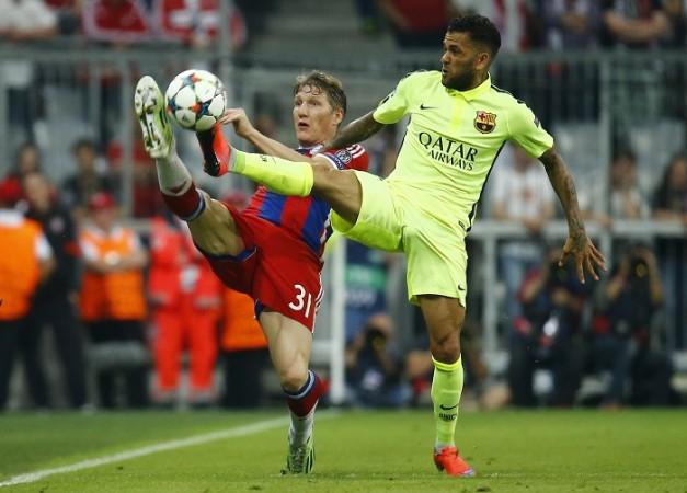 Alves (right) has reportedly been offered better wages by Manchester United Dani Alves