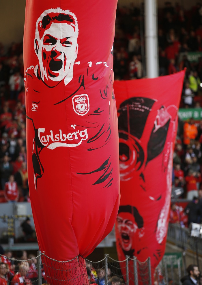 Liverpool fans wave a Steven Gerrard flag ahead of the Reds' Premier League clash against Crystal Palace on Sunday Steven Gerrard's farewell