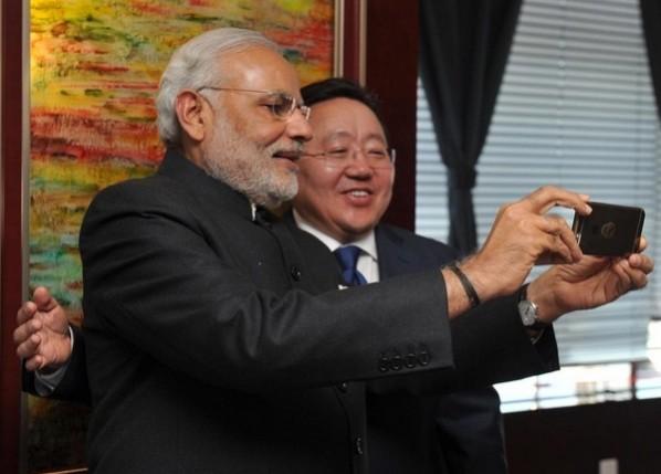 PM Narendra Modi takes a selfie with Mongolian President Tsakhiagiin Elbegdorj. Modi selfie with Mongolian President Elbegdorj