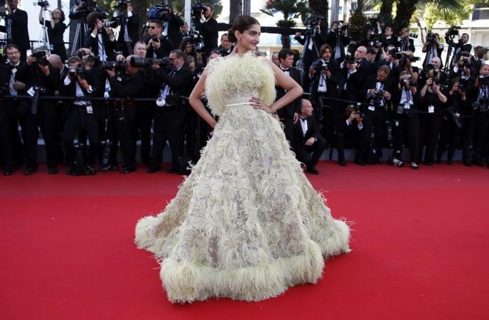 Actress Sonam Kapoor poses on the red carpet as she arrives for the screening of the animated film Sonam Kapoor