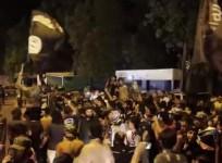 A video grab shows Isis supporters in Mosul celebrating the fall of Ramadi.