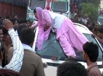 Video of woman smashing the windows of a minister's car goes viral