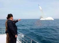 German experts claim that the images released by North Korea of the country successfully testing a submarine launched missile is found to have been photoshopped.