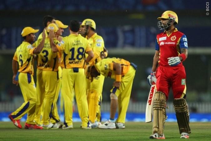 CSK players celebrate the wicket of RCB captain Virat Kohli CSK RCB Virat Kohli