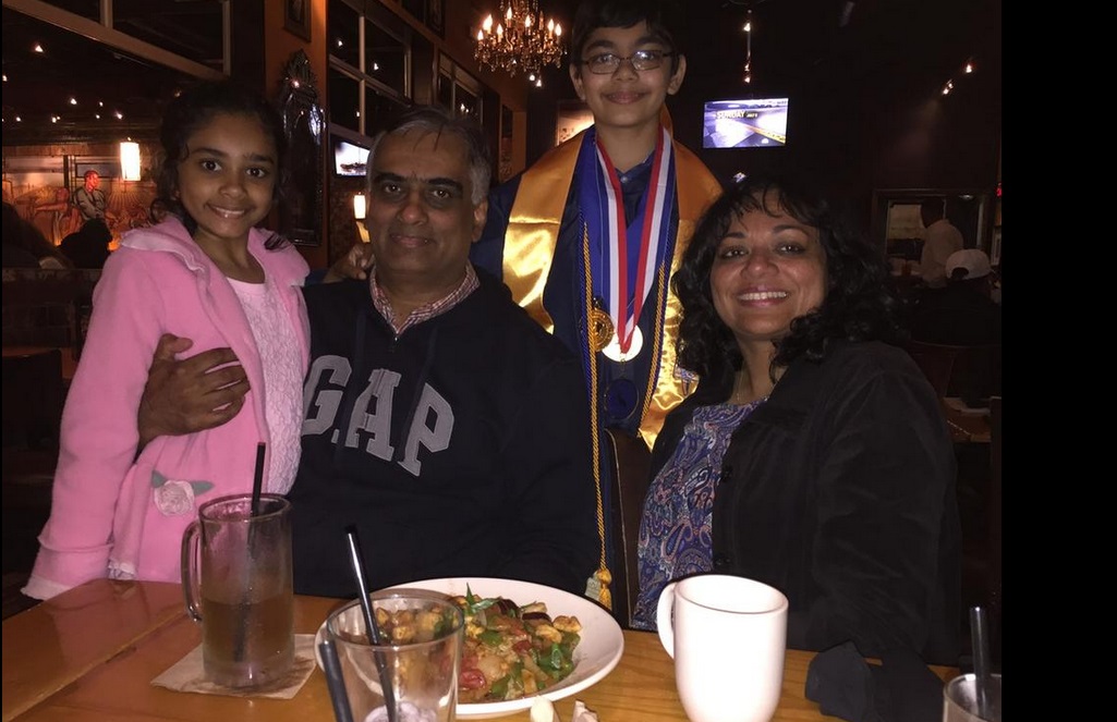 Tanishq Abraham with his sister Tiara and parents after graduation ceremony. Tanishq Abraham