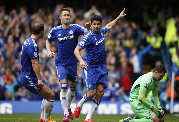 Diego Costa celebrates with team mates after scoring the first goal for Chelsea from the penalty spot Chelsea vs Sunderland