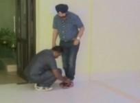 Bengal minister asks security guard to tie shoes