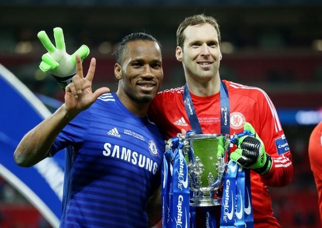 Didier Drogba and Petr Cech pose with the Capital One Cup Chelsea's Didier Drogba and Petr Cech