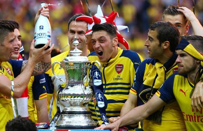 Arsenal were just too good for Aston Villa in the FA Cup 2015 final Mesut Ozil Aaron Ramsey Arsenal FA Cup Final 2015 Trophy