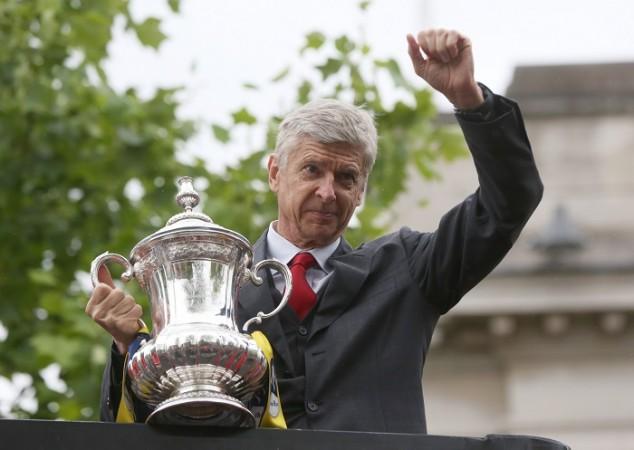 Arsenal manager Arsene Wenger wants more value-for-money signings this summer Arsene Wenger Arsenal FA Cup Trophy 2015