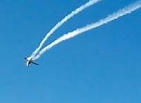 Pilot dies after light planes collide during air show