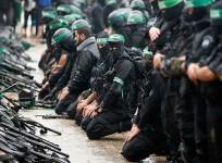 Palestinian members of al-Qassam Brigades, the armed wing of the Hamas movement