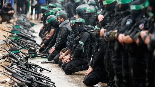 Palestinian members of al-Qassam Brigades, the armed wing of the Hamas movement