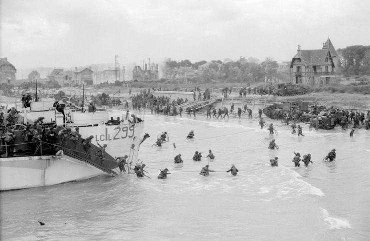 Canadian troops come ashore at a Juno Beach landing area on D-Day at Bernieres-sur Mer, France on June 6, 1944