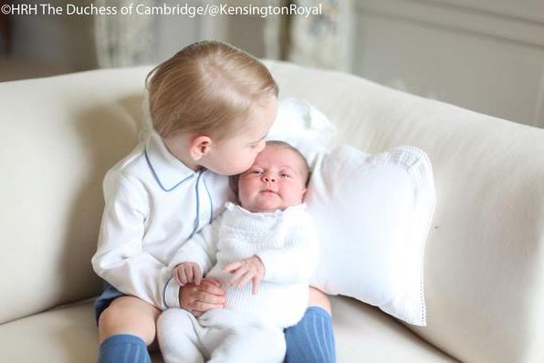 Prince George kisses little sister Princess Charlotte