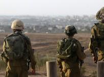 Israeli soldiers patrol near the border with the Gaza Strip.
