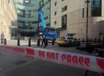 Police have arrested a man after he threatened to burn BBC's London office