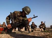 Volunteers from the Yazidi sect who have joined the Kurdish peshmerga forces to fight against Islamic State militants, take part in a training on the outskirts of the town of Sinjar