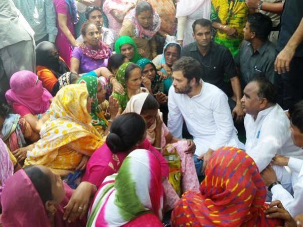 Congress vice-president Rahul Gandhi meets Delhi Safai Karmcharis during their agitation on 12 June. Rahul Gandhi with Safai Karmcharis