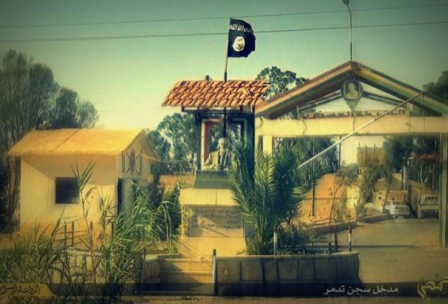 Images shows an Isis flag on the entrance to the city of Tadmur in Palmyra after it was captured by the group in May. Is Isis planning to destroy the ancient city of Palmyra? SOHR has reported that the militant group has rigged the city with explosives and land mines