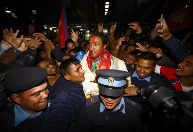 Paras Khadka (c) is the captain of the Nepal cricket team. Paras Khadka