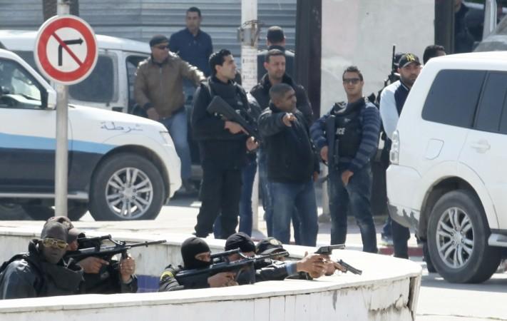 Isis militants reportedly were believed to behind the attack on two beach resort hotel on Friday in Tunisia. File Image shows men from country's counter-terrorist taking position during the terror attack at Bardo Museum in March.