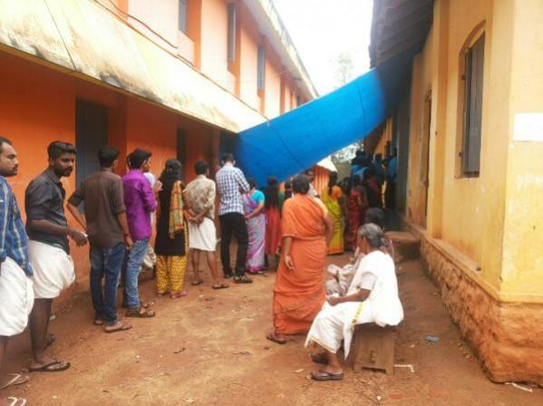 Voters waiting to cast vote during Aruvikara by-election. Voters waiting to cast vote during Aruvikara by-election.