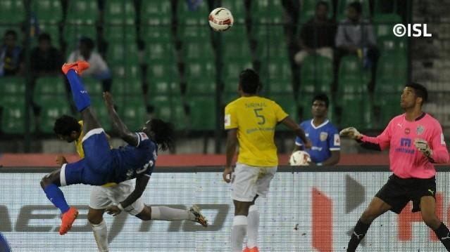 Chennaiyin FC's Bernard Mendy (blue jersey) scores one of the memorable goals of ISL 2014 Bernard Mendy