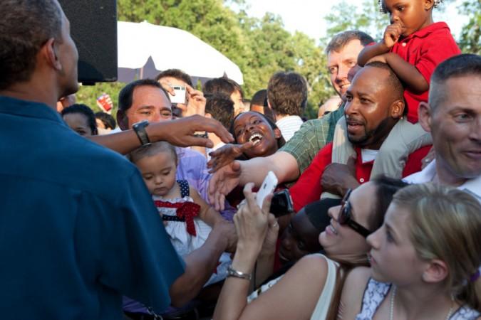 President Obama greets guests during the Fourth of July celebration on the South Lawn of the White House, July 4, 2010
