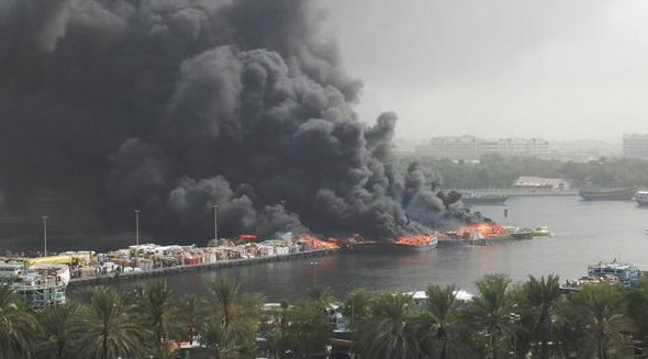 Dozens of docked vessels have been destroyed in the fire.