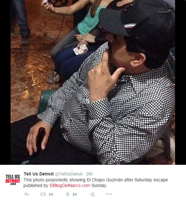 El Chapo holding a beer bottle. El Chapo holding a beer bottle.