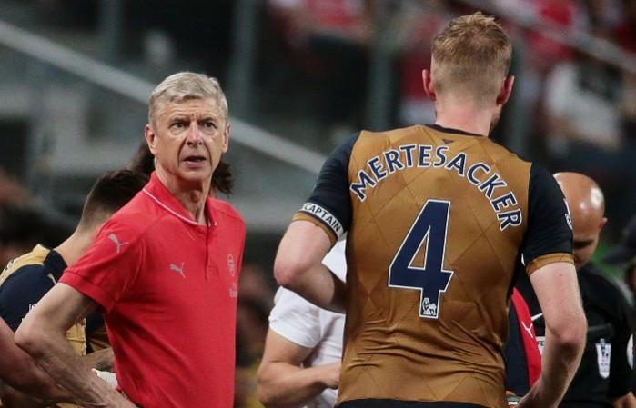 Arsene Wenger confirmed his big guns will play in the Barclays Asia Tour 2015 final against Everton Arsene Wenger Per Mertesacker Arsenal