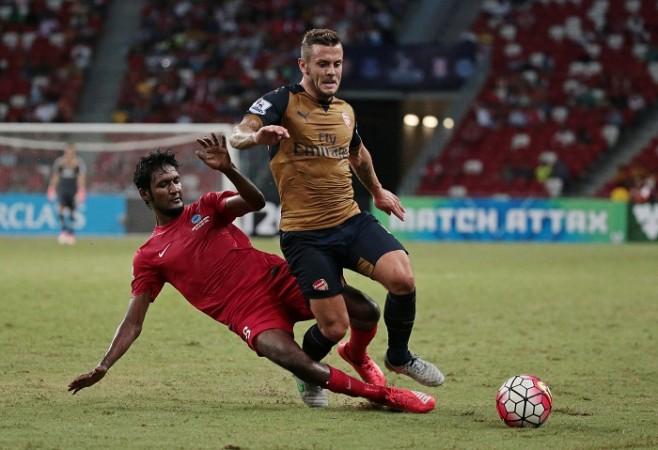 Arsenal midfielder Jack Wilshere in action against Singapore Select XI in the Barclays Asia Trophy 2015 Jack Wilshere Arsenal Madhu Singapore Select XI