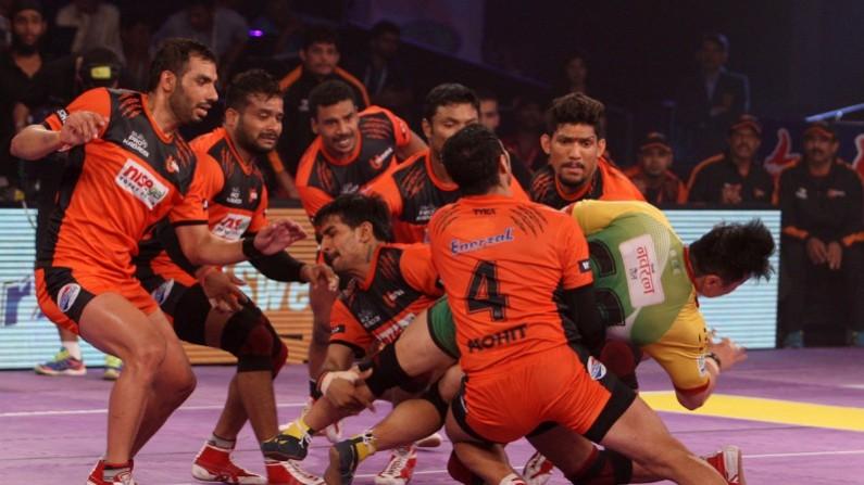 No way past for the Patna Pirates raider (yellow/green) as U Mumba display immense strength during their semi-final match on Friday u mumba semi final