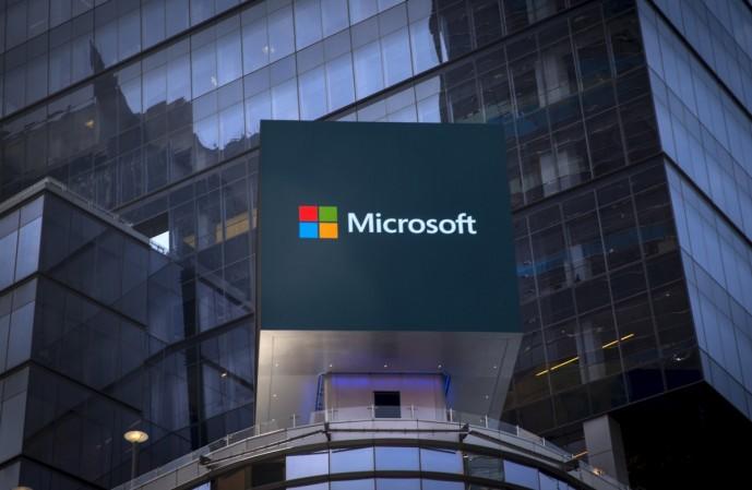 The Microsoft logo is seen on an electronic billboard on an office building in New York City, July 28, 2015. Microsoft