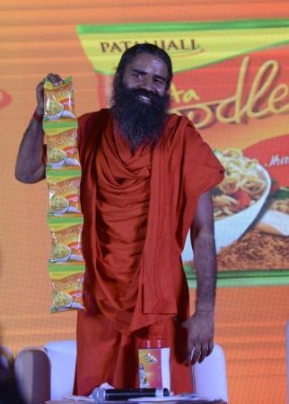Yoga Guru Ramdev launches Patanjali noodles in New Delhi on Nov 16, 2015. Patanjali atta noodles