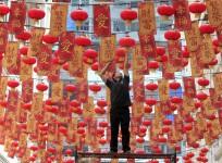 Chinese lanterns are being arranged as part of the decorations for Chinese New Year 2016 celebrations.