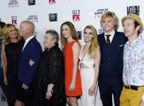 Emma Roberts and Evan Peters with the cast of