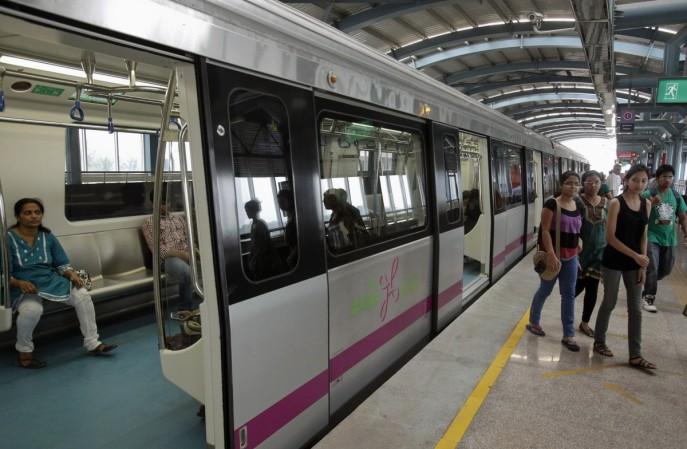 Commuters disembark from a Namma Metro Bangalore Metro Namma Metro Bangalore infra