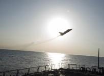 Russian plane near US ship