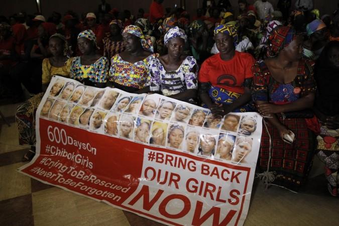 Protesters demanding action for the Chibok girls kidnapped by Boko Haram. Boko haram Chibok girls