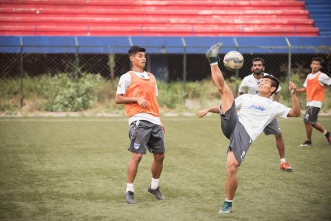 Bengaluru FC midfielders Eugeneson Lyngdoh and Thoi Singh in training at the Bangalore Football Stadium ahead of the game bengaluru fc