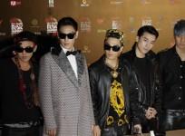 Members from South Korean pop group Big Bang pose backstage after winning Artist of the Year Award in the 2012 Mnet Asian Music Awards