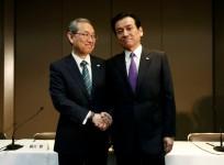 Toshiba Corp incoming President and chief executive Satoshi Tsunakawa (L) and incoming chairman Shigenori Shiga during a news conference at the company headquarters in Tokyo, Japan