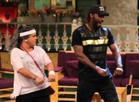 Cricketer Chris Gayle in "Jhalak Dikhhla Jaa 9"? Pictured: Chris Gayle shaking legs with Ali Asgar on "The Kapil Sharma Show."